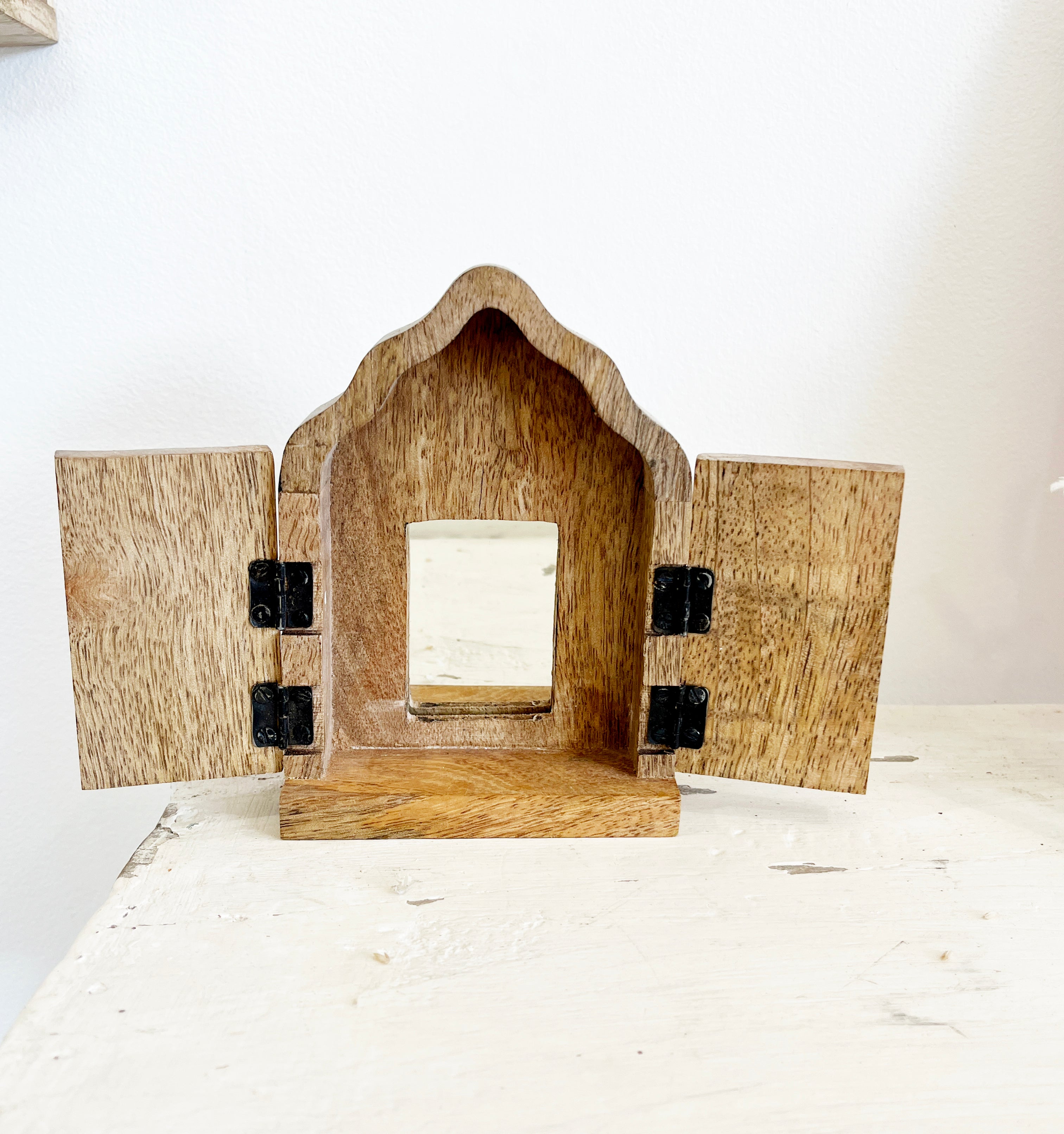 Wooden Sanctuary with doors and mirror