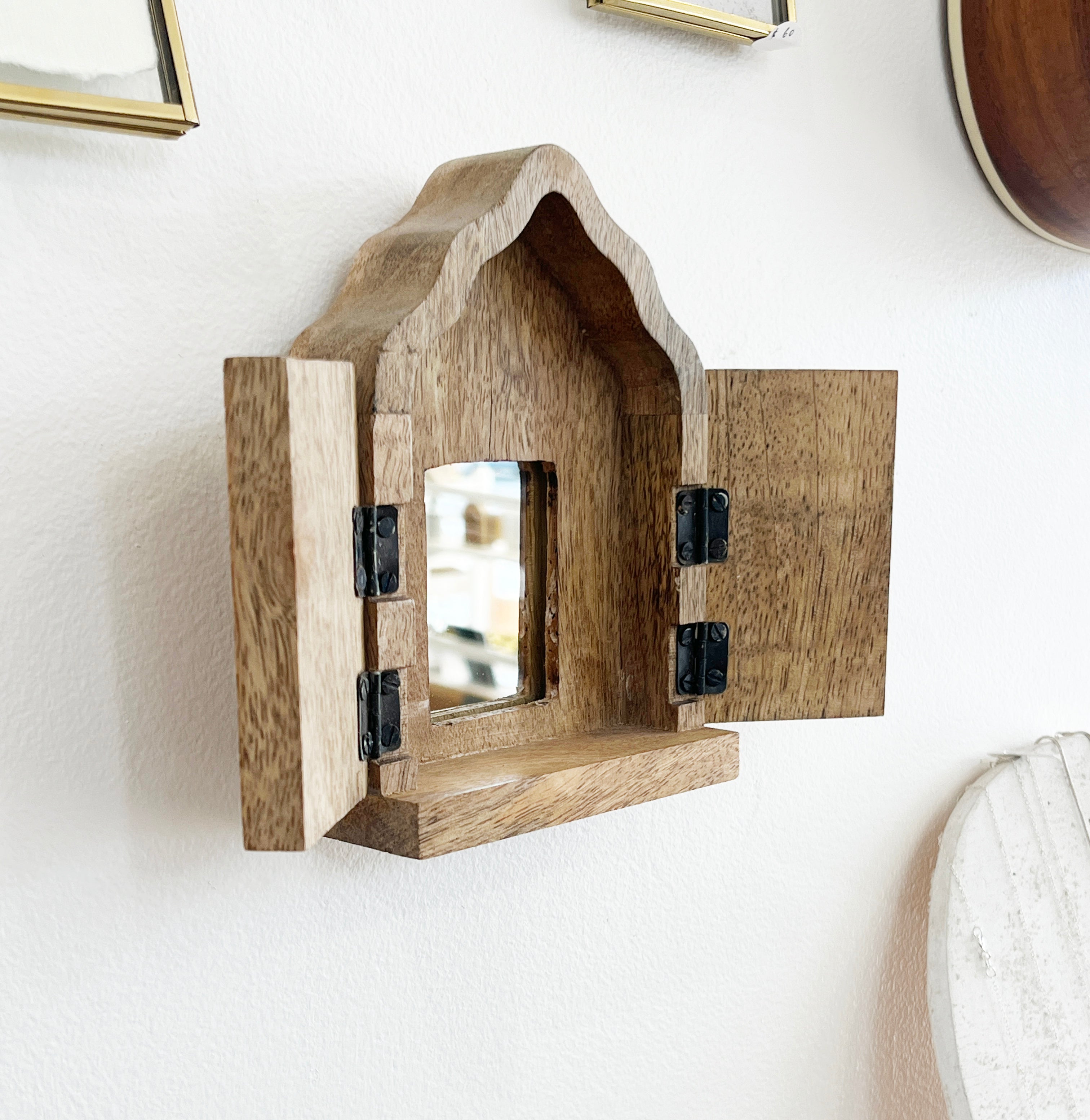 Wooden Sanctuary with doors and mirror