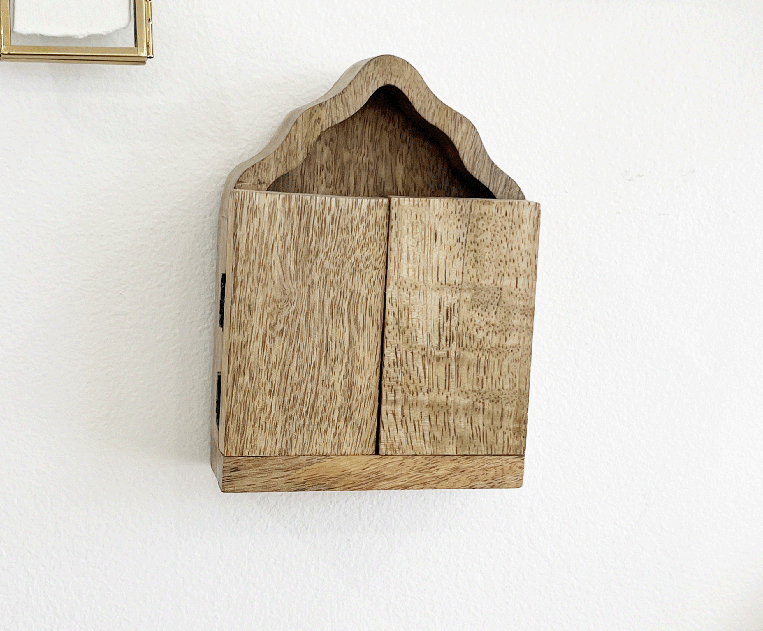Wooden Sanctuary with doors and mirror