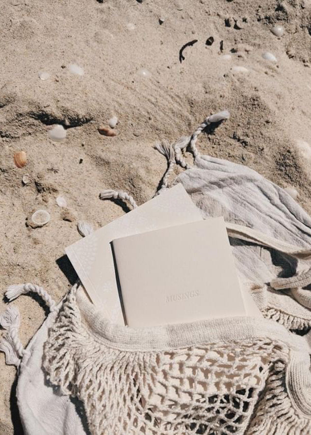 Notebooks pictured on the sandy beaches of south west Australia 
